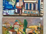 two paintings of a building and a boat on a wall
