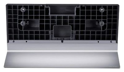 un gros plan d'une étagère métallique sur laquelle est posée une grille