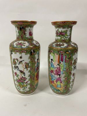 pair of antique chinese vases with asian scenes on them