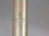 a close up of a metal pipe with a label on it