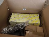 une boîte en carton contenant un matelas et une boîte dans laquelle se trouve un matelas