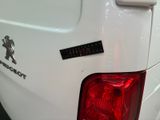 a close up of a car with a sticker on it