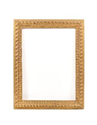 an old gold frame with a decorative pattern on a white background