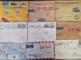 many different types of envelopes laid out on a table