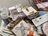 a pile of assorted items on a white table
