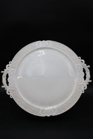 Plat rond en porcelaine Pouyat grain de riz. D : 40 cm
