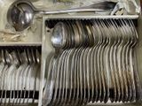 a lot of spoons and spoons in a drawer