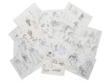 une pile de dessins représentant des personnes et des animaux sur une surface blanche