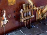 a close up of a machine that has a bunch of bottles on it