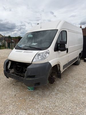 a white van that is parked in a lot