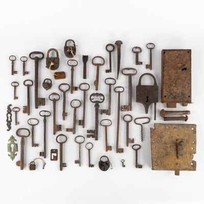 an image of a bunch of old keys on a white surface