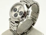 a watch that is sitting on a stand on a table