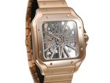 an image of a watch with a rose gold case and a black strap