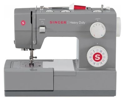 the singer heavy duty sewing machine is on display against a white background
