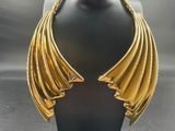 a close up of a necklace on a mannequin mannequin