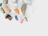 a lot of small figurines that are on the table