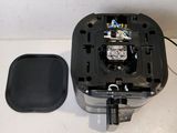 a black box with a black lid next to a black box with a black lid