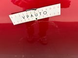 a picture of a red car with a sign that says v - auto