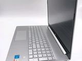 a laptop computer sitting on top of a white table