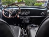 a view of the dashboard of a car from the driver ' s seat
