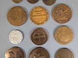 six different types of coins are shown on a blue surface