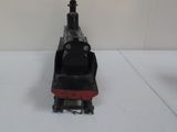 a toy train that is sitting on a white surface
