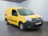 yellow and black van parked in a white room in a building