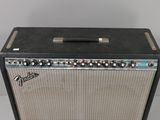 a close up of a guitar amplifier sitting on top of a table