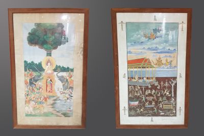 two paintings hanging on the wall of a room