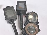 four different types of lights on a white table