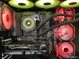 a close up of a computer case with red and green lights