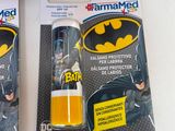 two packages of batman themed toothpaste on a white table