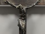a close up of a wooden cross with a crucif on it