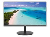 a computer monitor sitting on top of a table next to a beach