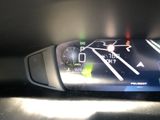 a car dashboard with a digital display on it