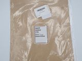 a bag with a label on it sitting on a table