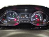 the dashboard of a car with two different gauges on it