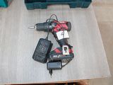 two tools that are sitting on a table