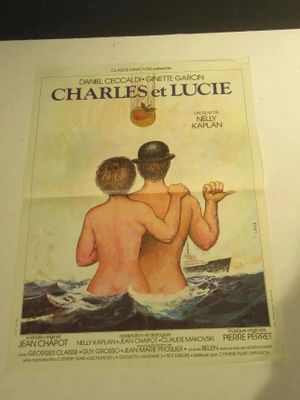 une photo d'une affiche de film représentant un homme et une femme dans l'eau