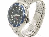 an image of a stainless steel wrist watch with a blue dial