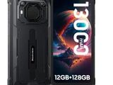 a black phone with a camera attached to the back of it