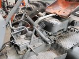 a tractor that is sitting in a garage