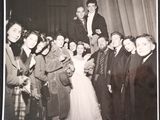 black and white photograph of a group of people posing for a picture