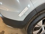 a close up of a car with a sticker on the side of it