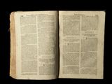 an open book with a black background and a black background