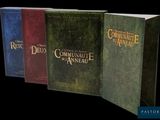 three books are lined up in a row on a black background