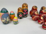 a lot of russian nesting dolls on a white surface