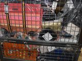 a large metal cart with many items in it