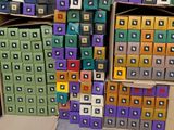 many boxes that are stacked on top of each other
