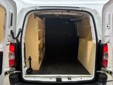 a white van that has the door open and the back door open